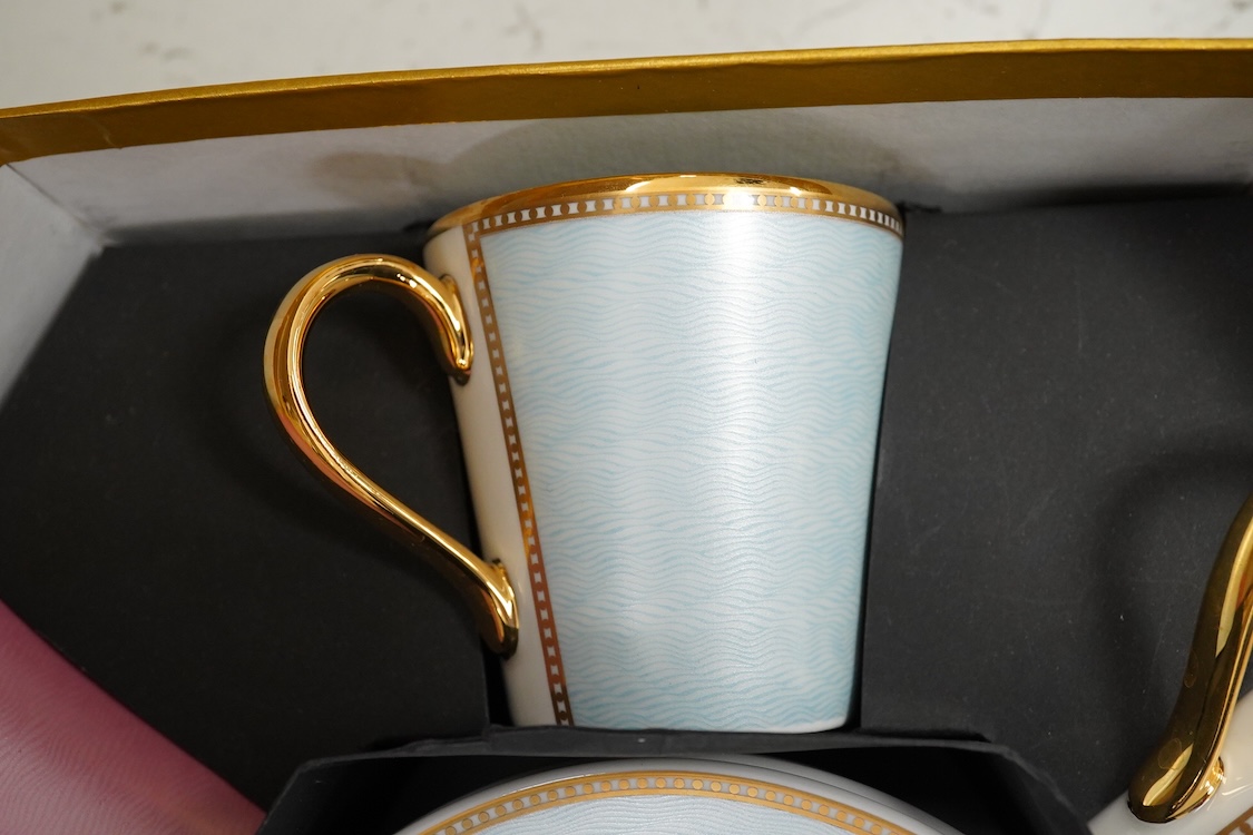 A Royal Collection of Faberge set of six bone china cups and saucers, boxed
